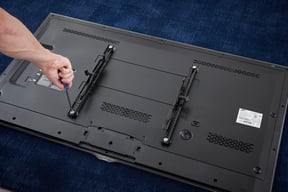 Mounting a TV - Attach Brackets to Back of TV