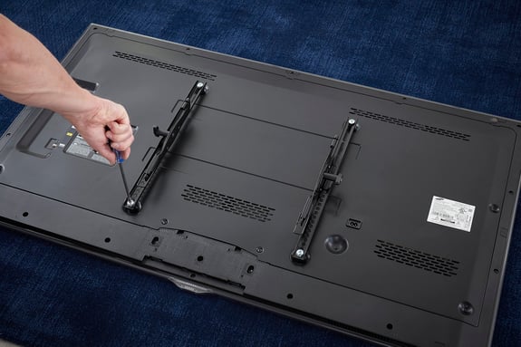 Mounting a TV - Attach Brackets to Back of TV